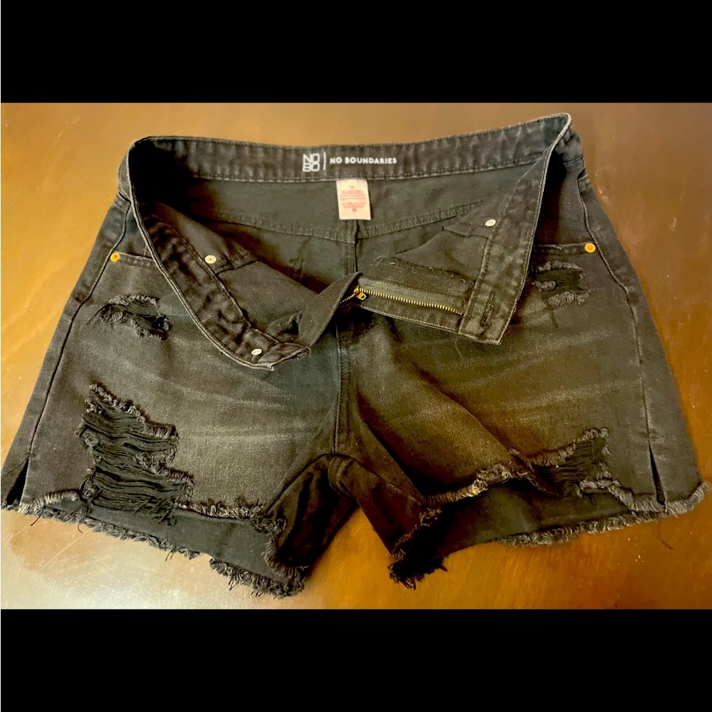 Black frayed shorts